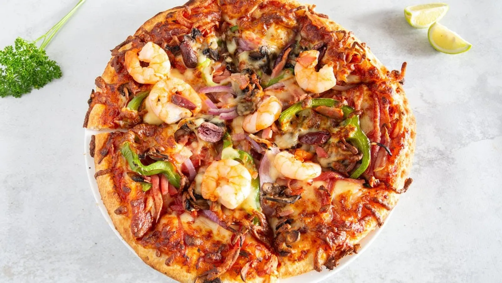 Seafood pizza with prawns and capsicum